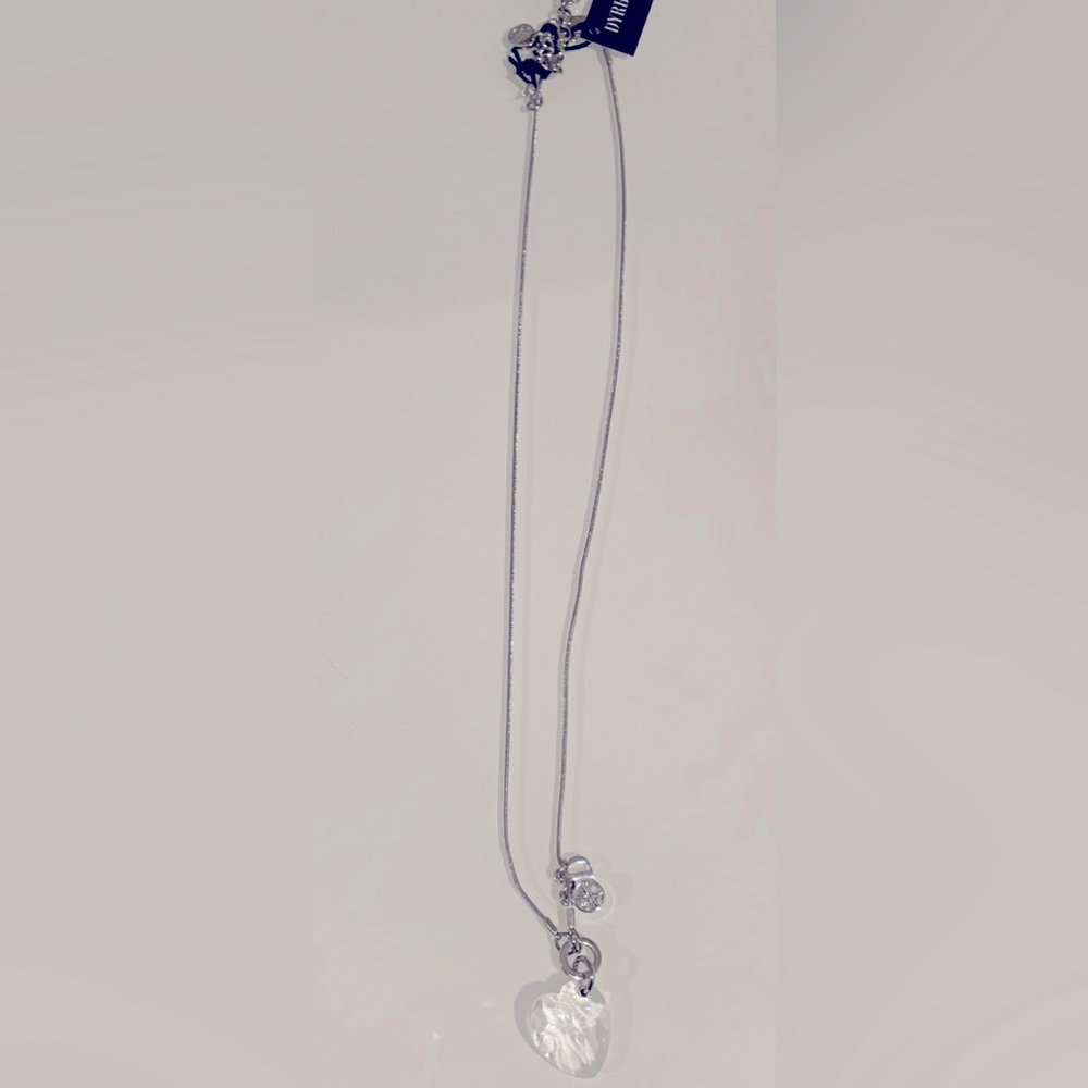 Silver necklace with clear Swarovski Crystal heart shape and CZ, jewelry pouch.